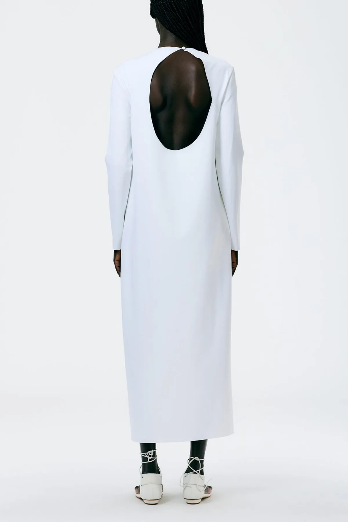 Compact Ultra Stretch Knit Long Sleeve Open Back Dress in White