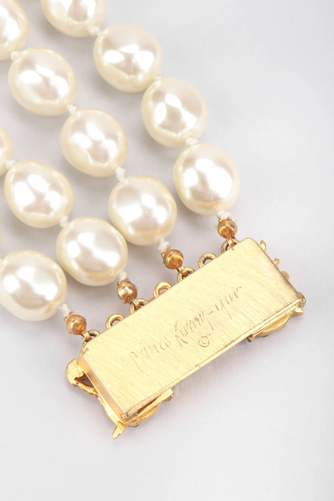 Multi-Strand Tiered Pearl Necklace