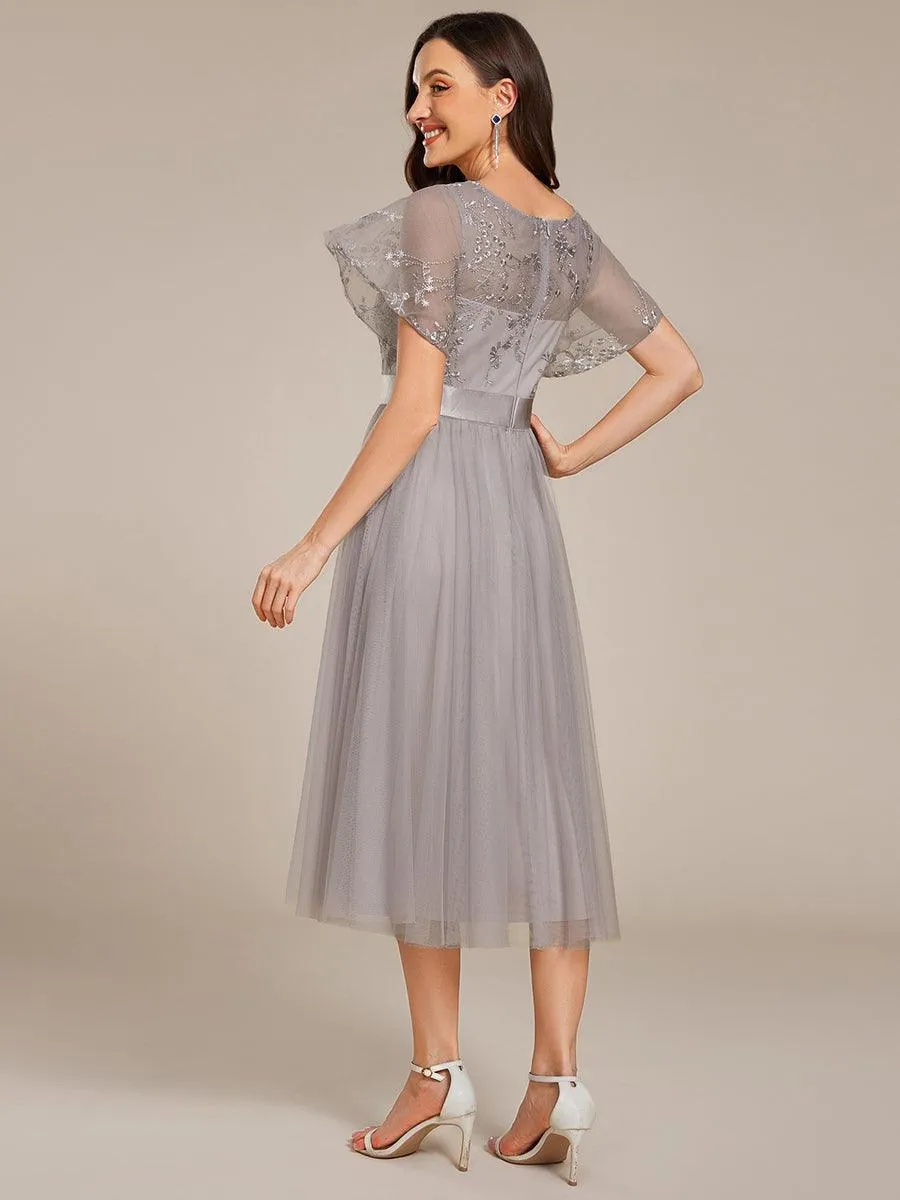 Robe de demoiselle d'honneur en tulle embelli avec manches transparentes