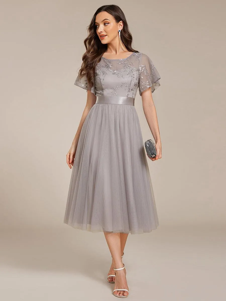 Robe de demoiselle d'honneur en tulle embelli avec manches transparentes
