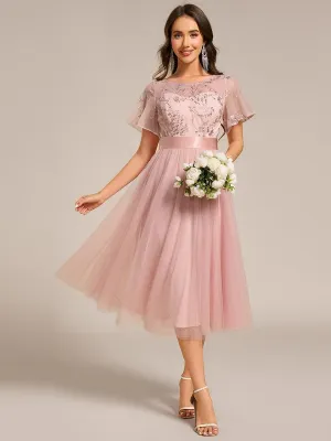 Robe de demoiselle d'honneur en tulle embelli avec manches transparentes