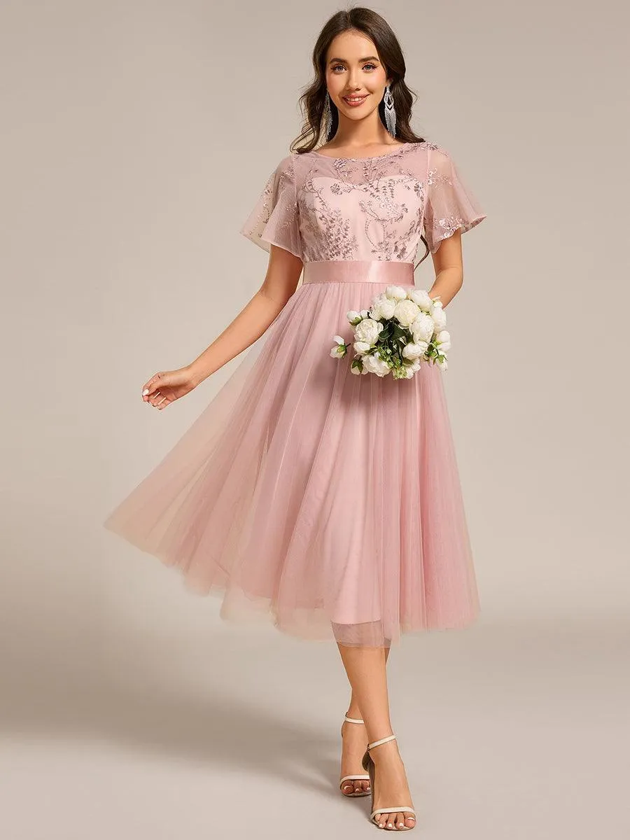 Robe de demoiselle d'honneur en tulle embelli avec manches transparentes
