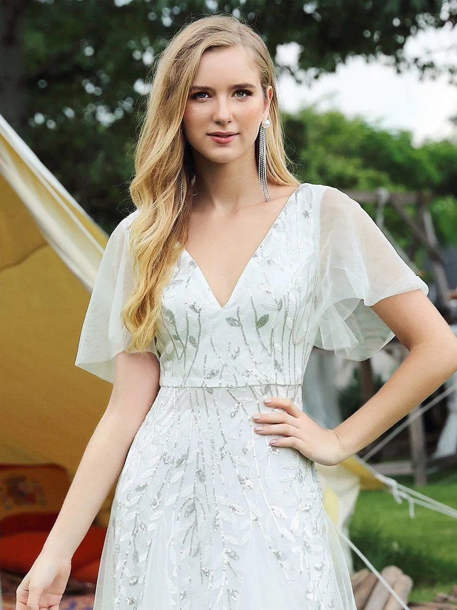 Robe de mariée longue à sequins et col en V scintillante et romantique